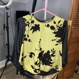 Elegant Floral Blouse with Polka Dot Sleeves